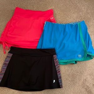 Three tennis/athletic skirts! Size XS. Good condition!